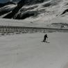 Imagen de un esquiador bajando por la pista de la Jungfrau, foto tomada el 22 de agosto de 2013 por Lugares de Nieve