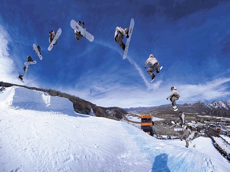 salto snowboard múltiple imagen