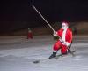 Papá Noel llega a Sierra Nevada esquiando por la pista iluminada de El Río