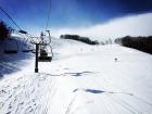 Subiendo en uno de los telesillas de Happo-One Hakuba