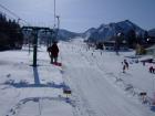 Subiendo en telesilla en Maiko Snow Resort